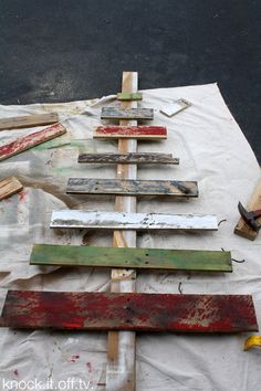 several pieces of wood sitting on top of a table