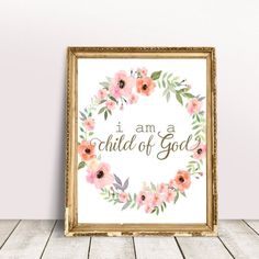 an ornate frame with flowers and the words i am a child of god on it