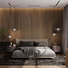 a modern bedroom with wood paneling and gray bedding