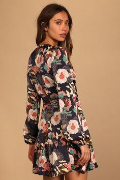 Lulus Exclusive! Celebrate the day and do it in style with the Lulus So Splendid Navy Blue Floral Satin Long Sleeve Wrap Dress! Sleek woven satin (with a lovely mauve and ivory floral print) sweeps across a darted, wrapping bodice and long sleeves with gathered shoulders and elastic cuffs. Two ties secure the high waist above a wrapping A-line skirt with a ruffled mini hem. Fit: This garment fits true to size. Length: Mid-thigh. Size small measures 34.5" from shoulder to hem. Bust: Great for any Winter Family Photos, Satin Wrap Dress, Long Sleeve Wrap Dress, Satin Long Sleeve, Green Floral Dress, Cup Size, Dress 100, A Line Skirts, Blue Floral