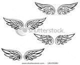 set of wings with swirls on white background stock photo, images and clipart