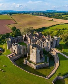 an aerial view of a castle in the countryside