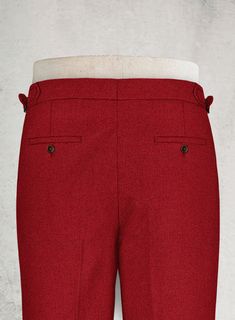 Relaxed and easy, our Naples Red Highland Tweed Trousers are one that won't require much thought and styling efforts, will be a nice change from your staples and still cover a wide array of activities. Crafted from pure wool, these trousers fashion a pop of red that is always a good idea especially when the season is getting into a Christmas mood, its solid appearance will let you completely enjoy the love and power of the color. These trousers will be a perfect match for many styles and occasio Classic Red Bottoms With Welt Pockets, Tailored Classic Red Pants, Tailored Classic Red Bottoms, Classic Tailored Red Pants, Classic Tailored Red Bottoms, Classic Red Bottoms For Winter, Classic Red Winter Bottoms, Fabric Cross, Tweed Trousers