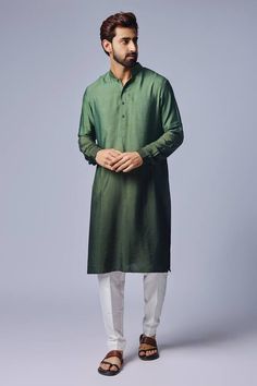 Green straight kurta in ombre effect. Comes with contrast pyjama pant. Components: 2 Pattern: Plain Neckline: Mandarin Sleeve Type: Straight Full Fabric: Cotton Silk Color: Green Other Details:  Cuff sleeves Closure: Front button placket Occasion: Mehendi and Puja - Aza Fashions Kurta Set For Men, Kurta Pyjama, Vacuum Storage, Green Ombre, Ombre Effect, Kurta With Pants, Georgette Fabric, Fashion App, Cotton Pyjamas