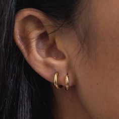 This basic gold huggie is a great addition to your everyday essentials! We love rocking a simple earring like this with statement necklaces to bring a look together without taking attention away from bigger, bolder pieces. Product Details: Stainless Steel + Gold Plated Tarnish Resistant and Water Resistant Hypoallergenic Now comes in 4 sizes .5” 1” 1.5" 2” Basic Earrings, Gold Huggies, Hair Gift, Basic Jewelry, Love Rocks, Zodiac Jewelry, Naruto Oc, Statement Necklaces, Anklet Bracelet