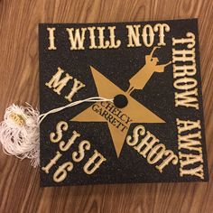 a black and gold graduation cap with the words, i will not my charity show