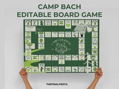 a person holding up a board game with the words camp bach editable board game