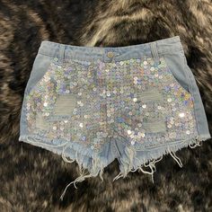 Light Wash Denim Distressed Shorts With Silver Sequins Size Small (Runs From 2-4) Never Worn Stretch Denim Jean Shorts For Night Out, Spring Festival Sequin Bottoms, Ripped Bottoms For Summer Party, Ripped Bottoms For Spring Party, Ripped Bottoms For Party In Summer, Mid-rise Jeans For Summer Party, Spring Party Jeans In Short Length, Spring Party Jeans Shorts, Summer Party Denim Blue Bottoms