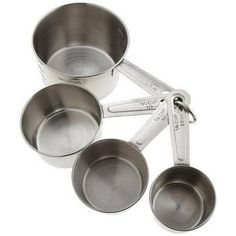 three measuring cups and four measuring spoons