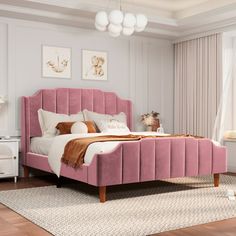 a bedroom scene with focus on the bed and nightstands, along with an area rug