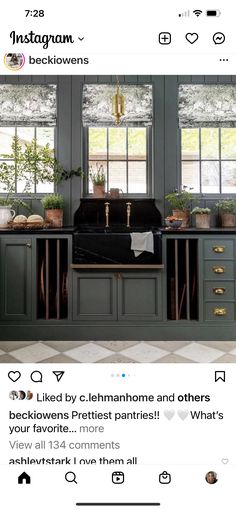 a kitchen with green cabinets and black counter tops is featured in the instagram for instagram