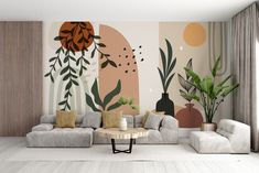 a living room with couches and plants on the wall