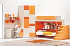 an orange and white bedroom with a desk, bed and bookcase in the corner