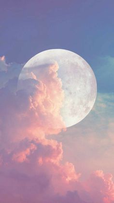 the moon is shining brightly in the sky above some clouds and pinkish blue skies