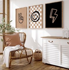 a living room with wooden flooring and white walls decorated with art on the wall