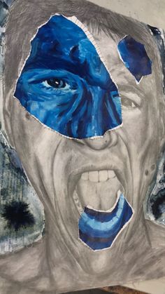 a drawing of a man's face with blue paint on it and his mouth open