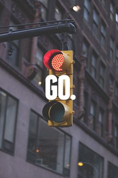 a traffic light with the word go written on it