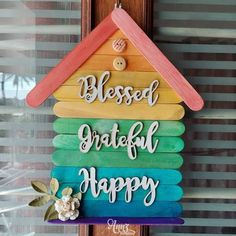 a wooden sign that says, blessed grateful happy