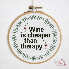 a cross stitch pattern with the words wine is cheap than therapy