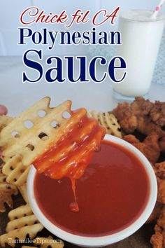 a close up of a plate of food with waffles and ketchup