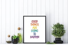 there is a poster with the words good things are going to happen on it next to some potted plants