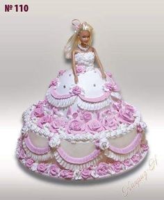 a barbie doll is sitting on top of a pink and white wedding dress with roses