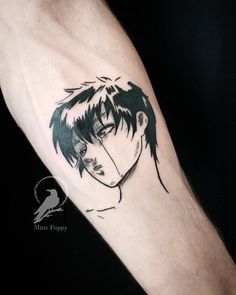 a man's arm with a black and white anime character tattoo on it