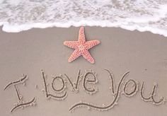 i love you written in the sand with a starfish on it's side