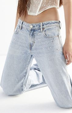 Step into the spotlight with the Casey Light Indigo Rhinestone Low Rise Baggy Jeans from PacSun. Boasting a trendy low-rise waist, these jeans feature rhinestone-studded front details that add a touch of glamour, while the wide-leg openings with a baggy fit offer comfort and style in one go-to pair of denim. They're made with sustainably sourced cotton for an eco-friendly update.


	Model is wearing a size 26
	Model measurements: 5’8.5” height, 32” bust, 23.5” waist, 35” hips


Learn more about PacSun eco items Affordable Beachy Low-rise Bottoms, Edikted Raelynn Low Rise Jeans, Low Rise Abrand Jeans, Pacsun Eco Medium Blue Low Rise Baggy Jeans, Cheap Low-rise Denim Bottoms, Low Rise Baggy Jeans, Pacsun Jeans, Jeans Pacsun, Curve Jeans