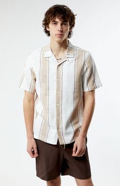 Elevate your everyday style with the Woven Camp Shirt, delivering a luxe finish to your look. This shirt features a collared neckline, short sleeves, a regular fit, black button closures, and a woven textured finish. With its refined details, it provides a sophisticated and versatile option for upgrading your wardrobe.


	Collared neckline
	Short sleeves
	Standard fit
	Button closures
	Textured woven fabrication
	100% Rayon
	Machine washable
	Model is wearing size medium
	Model Measurements: 6'3 Modern Shirt With Button Closure And Camp Collar, Modern Shirt With Camp Collar And Button Closure, Classic Camp Shirt With Collared Neckline, Classic Camp Shirt With Button Closure, White Classic Short Sleeve Shirt With Camp Collar, Classic White Short Sleeve Shirt With Camp Collar, White Short Sleeve Shirt With Camp Collar, Modern White Collared Short Sleeve Shirt, White Casual Short Sleeve Shirt