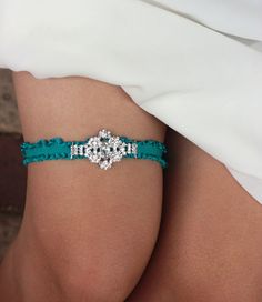 "Turquoise Wedding Garder - Something Blue Wedding Garter - Teal Garter --- This piece serves as an elegant and simple \"Something Blue\" for your Wedding! .♥. DESCRIPTION .♥. This Wedding Garter is made with a silver rhinestone accent on a very soft and comfortable stretch garter band. .♥. COLOR .♥. Available in Turquoise, Light Blue, Black and White - see options when you check out! Please message us about other custom colors. .♥. SIZE .♥. Standard size options are available at checkout, If yo Blue Wedding Garder, Teal Dress For Wedding, Turquoise Wedding Cake, Wedding Garder, Turquoise Wedding Theme, Teal Wedding Colors, Wedding Garter Blue, Flower Girl Accessories, Blue Garter