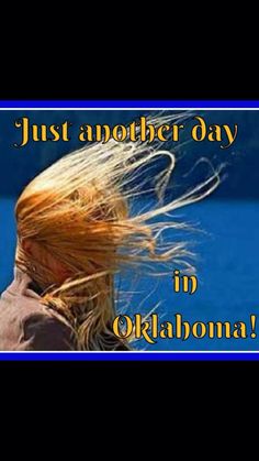 a woman with her hair blowing in the wind and text just another day in oklahoma