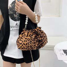 Place Of Origin : BEIJING Place Of Origin : HE BEI Province Occasion : party Model Number : BD-174 Exterior : none Hardness : SOFT Closure Type : string Pattern Type : LEOPARD Gender : WOMEN Style : Lady Decoration : Beading Lining Material : POLYESTER Main Material : PU Shape : Hobos Brand Name : zsxcaaan CN : BEIJING Leopard/Tiger/Zebra Pattern Womens Bag Trend Small Elegant Tote Shoulder Bag Luxury Designer Handbag Pearl Chain Hobos Sac Material: PUSize: Upper Width(16cm)*Lower Width(26cm)*He Trendy Animal Design Pouch Bag, Trendy Brown Bag With Animal Design, Trendy Animal Design Bags For Daily Use, Trendy Bags With Animal Design For Everyday, Trendy Leopard Print Bag With Removable Pouch, Trendy Everyday Bags With Animal Design, Trendy Animal Design Bags For Everyday Use, Trendy Travel Bags With Animal Design, Leopard Print Bag With Chain Strap For Everyday Use