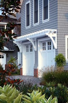 an image of a house with blue and white accents