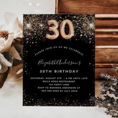 an elegant 30th birthday party with black and gold confetti on the front, white flowers in the background