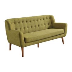 a green couch sitting on top of a wooden frame