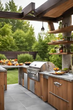 an outdoor kitchen with wood cabinets and stainless steel appliances