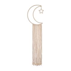 a white wall hanging with a crescent and star on it's side, in the shape of a tassel