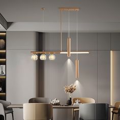 a dining room with chairs and a table in front of a wall mounted light fixture