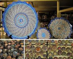 there are several pictures of decorative plates on display in the store, one is blue and the other is brown