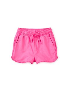 Play-and-party ready thanks to the pretty pom pom trim that'll have your little one look all dressed up without even trying. Crafted of soft 100% cotton jersey, these shorts are designed for easy wear with an elastic waist and functional drawstring. Pair with an original design from our graphic tee shop and you have a summer-ready outfit. Pink Pom Pom, Pom Pom Shorts, Pom Pom Trim, Gym Shorts, The Pretty, Knit Shorts, Tea Collection, Summer Ready, Easy Wear