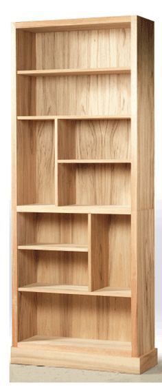 a wooden bookcase with three shelves on each side