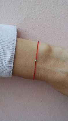 Red string bracelet. Red string of fate bracelet. Kabbalah Red String Of Fate Bracelet, String Of Fate, Red String Of Fate, Crystal Ball Necklace, Diy Bracelets With String, Kabbalah Bracelet, Red String Bracelet, Beaded Necklace Diy, Diy Bracelets Easy