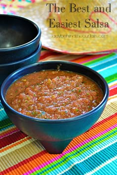 two bowls of salsa on a colorful table cloth with the title, the best & fastest salsa