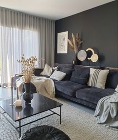 a living room filled with furniture and decor