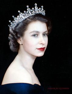 an old photo of a woman wearing a tiara