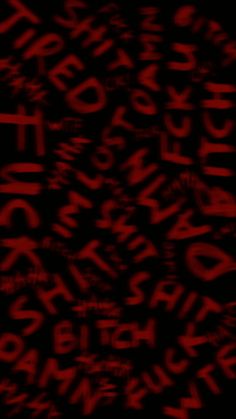 an abstract red and black background with letters