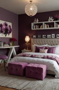 a bedroom decorated in purple and white with a large bed, ottomans, bookshelves, and pictures on the wall