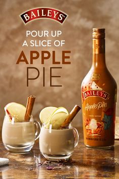 an advertisement for bailey's is shown with two glasses filled with apple cider