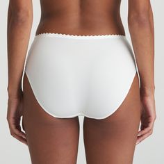 The shimmery embroidery at the hips gives these stylish high-waisted briefs a feminine touch. The perfect choice if you love en elegant look and a comfy fit! Natural goes with everything and is perfect for brides! Chic White Seamless Bottoms, Chic Seamless White Bottoms, White Shaping Shorts, White Brief Bottoms With Wide Waistband, Chic Stretch Bottoms For Wedding, Classic White Brief Bottoms, Elegant Shaping Summer Bottoms, Elegant Summer Shaping Bottoms, High Waisted Briefs